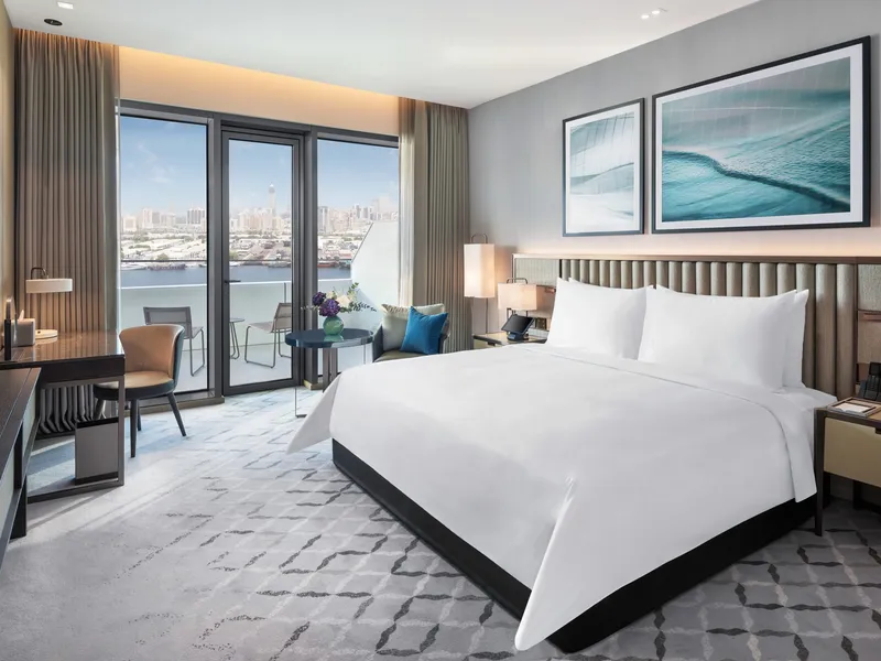The Address Downtown Dubai — ultra-luxury tower with rooftop infinity pool overlooking Burj Khalifa and Dubai Fountain