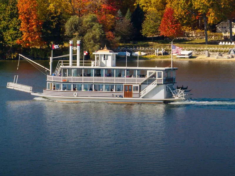 Private Yacht Cruise Lake Geneva — sunset cocktails on the water with Jet d'Eau and Alps backdrop