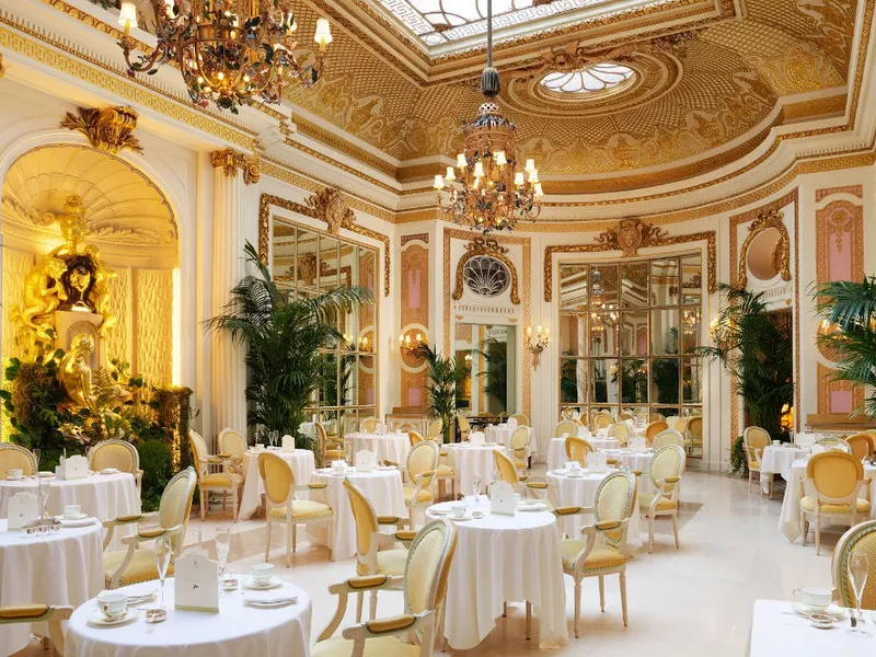 Afternoon Tea at The Ritz London — elegant three-tier cake stand with fine china in the Palm Court