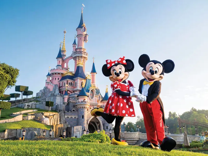Disneyland Paris Fast-Track — Sleeping Beauty Castle with fireworks at night