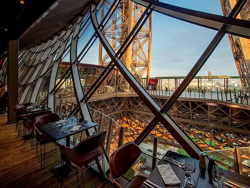 Eiffel Tower Gastronomy Experience — private dining table with champagne and Paris view