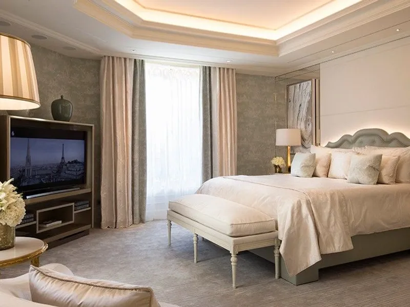 Four Seasons Hotel George V — elegant Art Deco lobby with floral arrangements in Paris