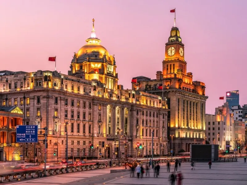 Night Walk Private Guided Bund Experience — Art Deco facades illuminated at night along the legendary Bund